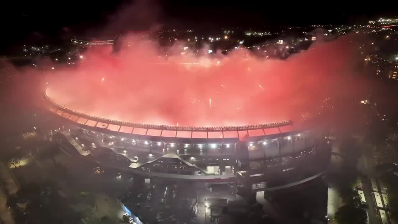 ABI MasterMind redesign: stadium lit by red flares