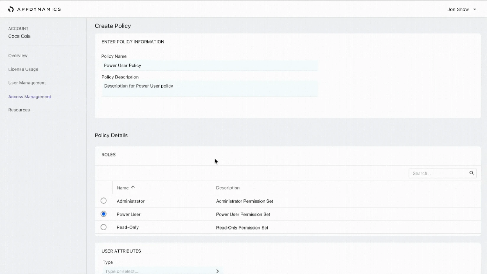 The Create Policy screen shown in full: account context on the left, policy information, and a roles table with permission set descriptions.